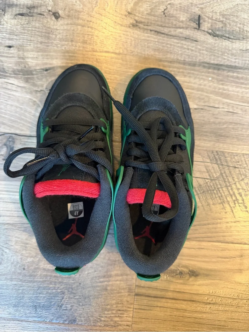NWOT Kids Air Jordan 4 RM (size 4Y)